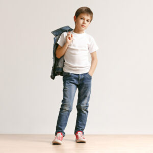 portrait-cute-little-boy-stylish-jeans-clothes-looking-camera-studio